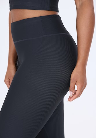 Athlecia Skinny Sportbroek 'Colbie' in Blauw