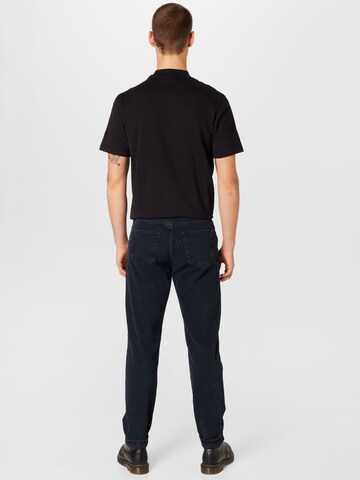 Calvin Klein Jeans Дънки Tapered Leg Дънки в синьо