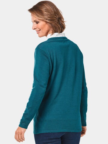 Goldner Strickjacke in Blau