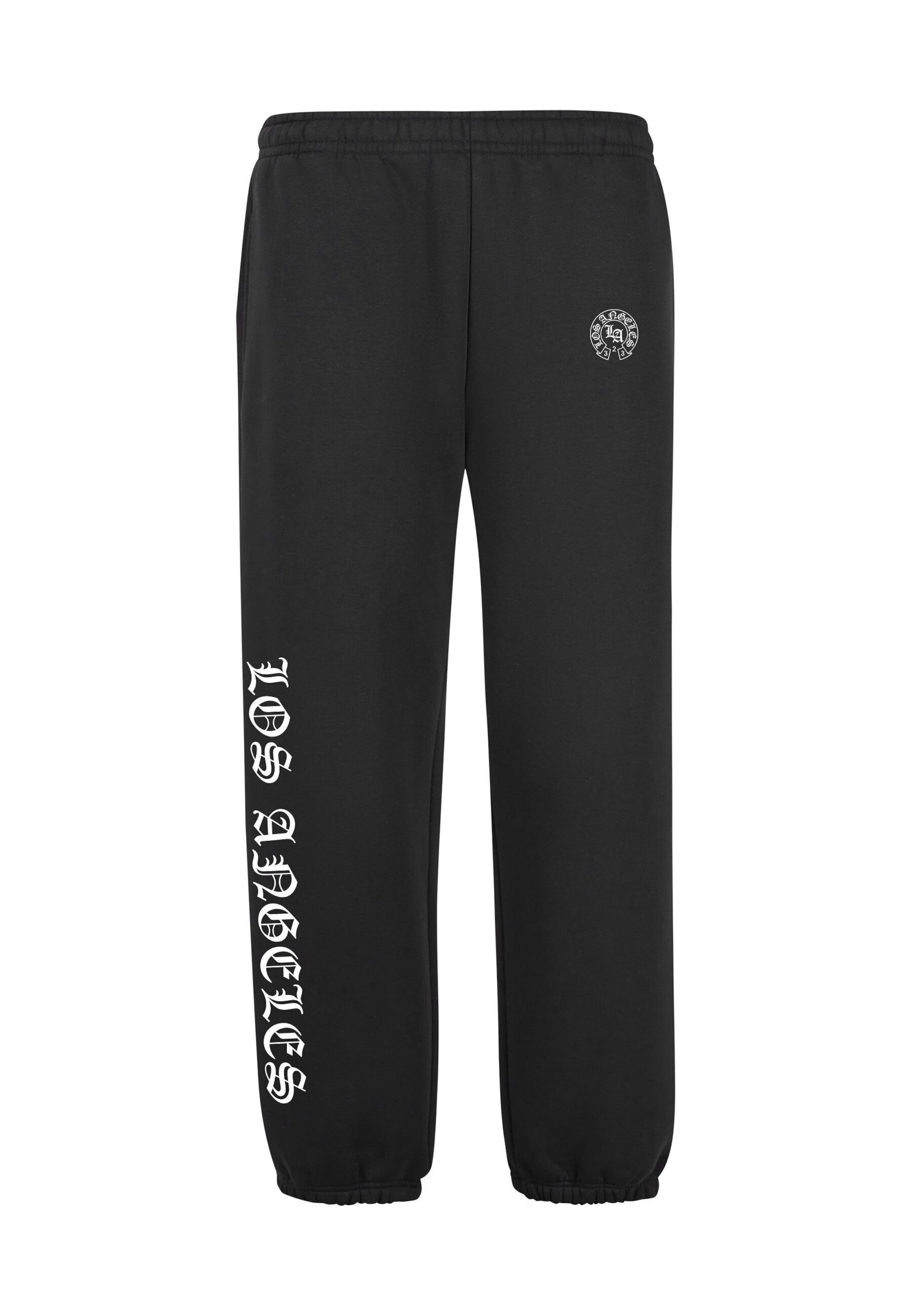 Effilé Pantalon 'LA Dynasty' Mister Tee en noir : devant