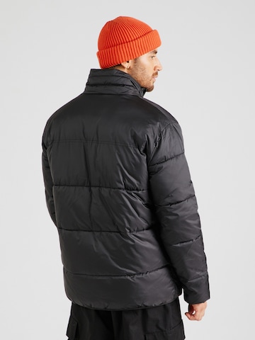 ELLESSE Between-Season Jacket 'Caloroso' in Black