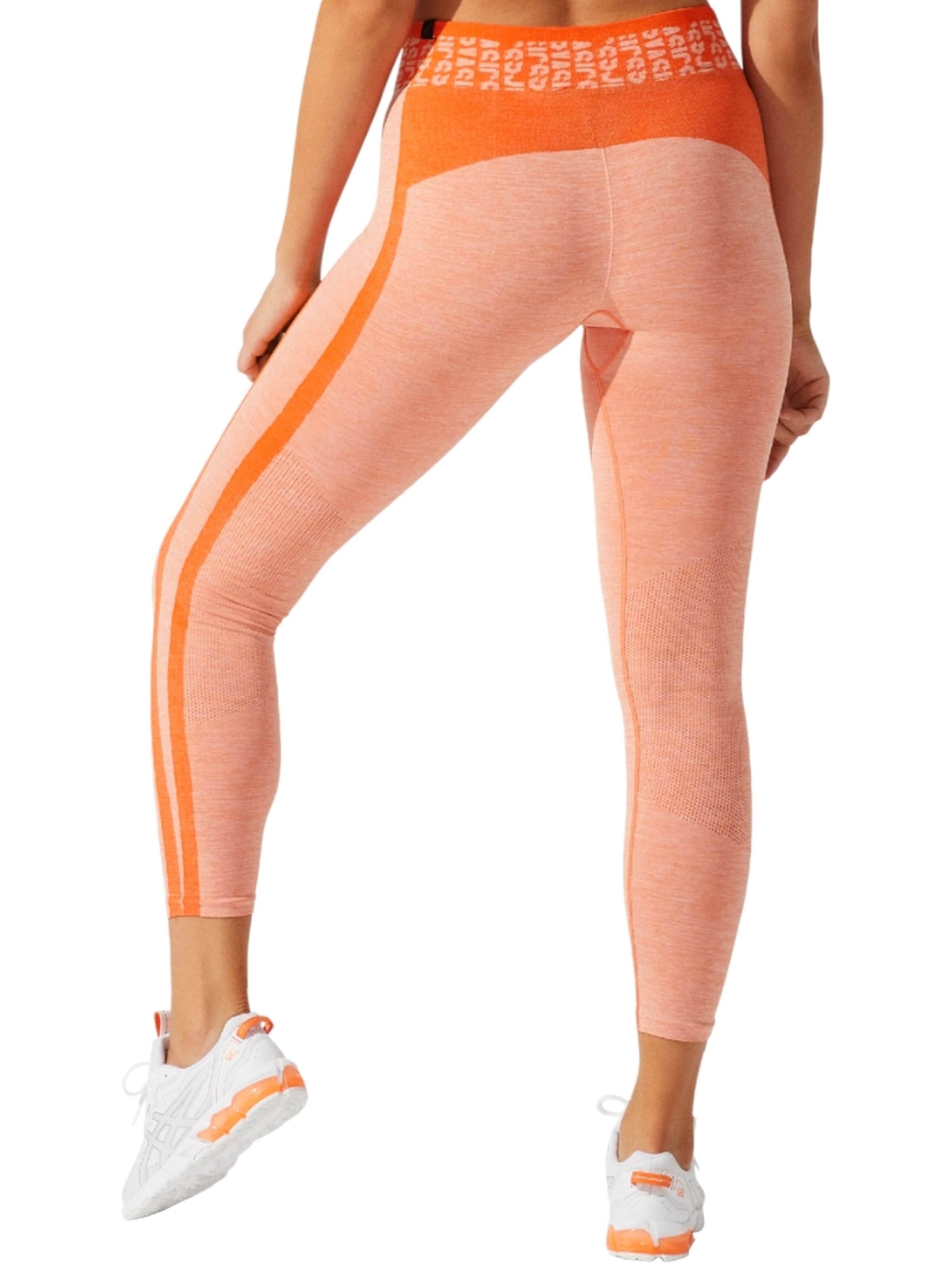 ASICS Skinny Leggings 'Asics W Cropped Logo Seamless Tight' in Oranje