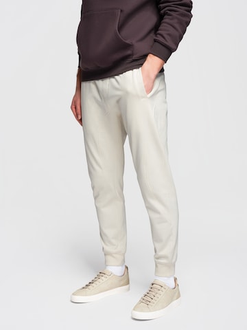 Effilé Pantalon de sport Ombre en beige