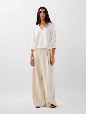 Pull-over ' ' Scalpers en blanc : devant