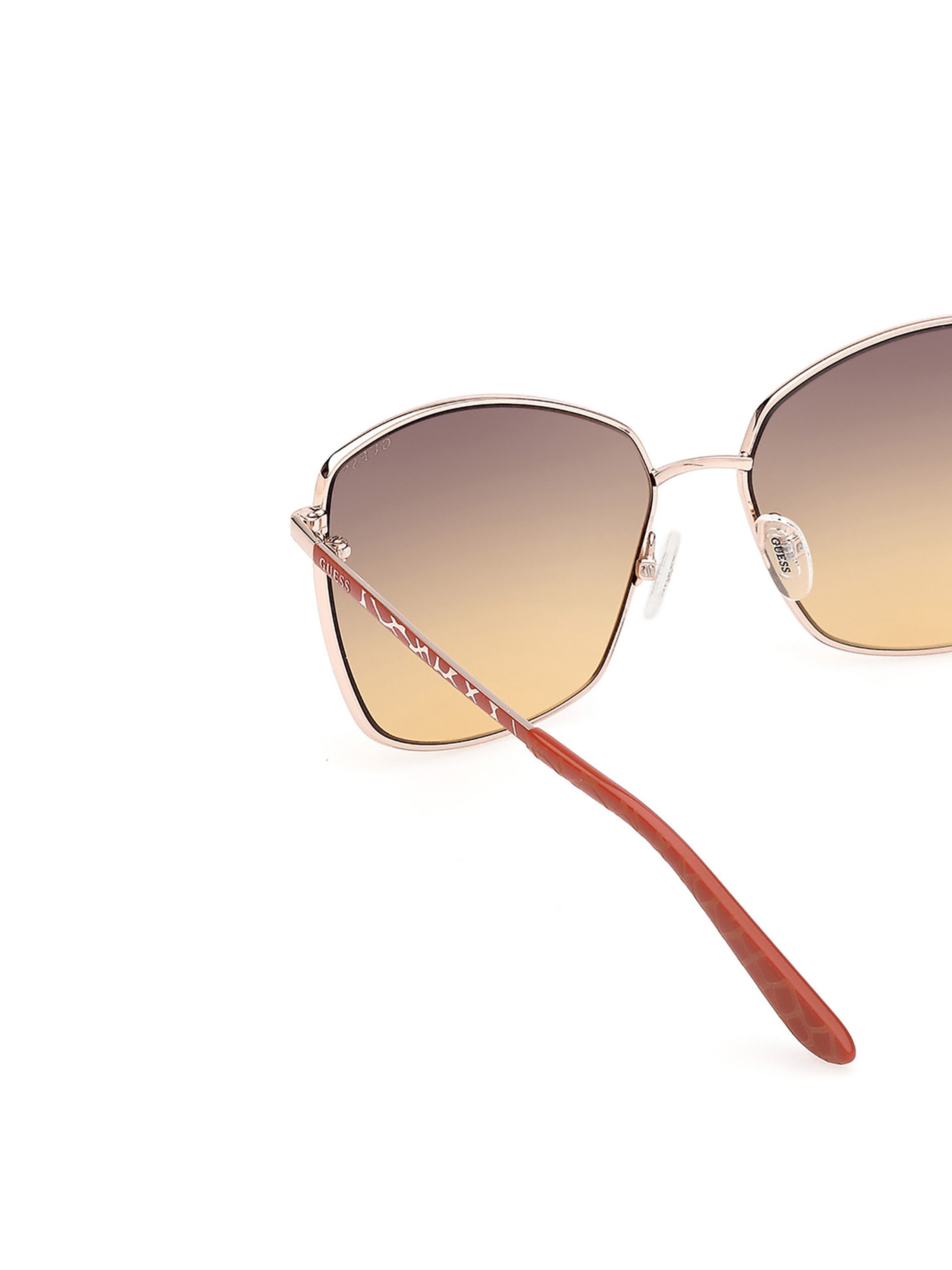 GUESS Sunglasses in Gold