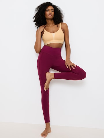 Invisible Soutien-gorge de sport 'Triaction Energy Lite' TRIUMPH en orange