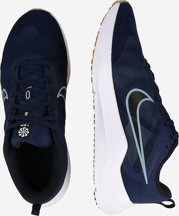 NIKE - Sapatilha de corrida 'Downshifter 12' em azul