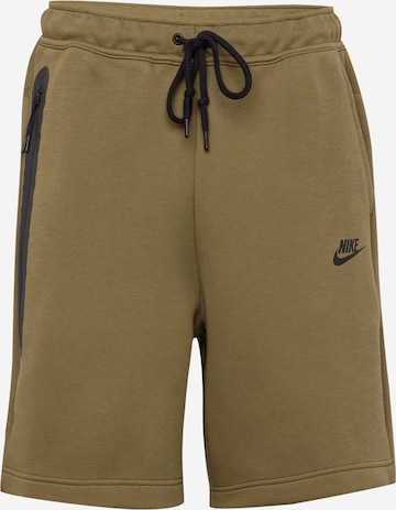 Nike SportswearLoosefit Hlače 'Tech Fleece' - zelena boja: prednji dio