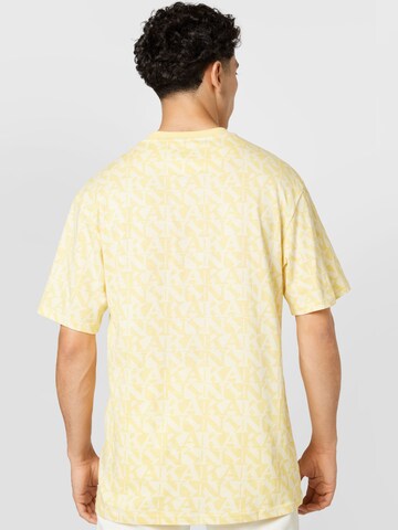 Karl Kani T-Shirt in Gelb