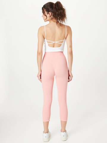 Skinny Pantaloni sportivi 'CASARANO' di FILA in rosa