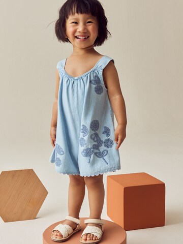 Next - Mono en azul: frente