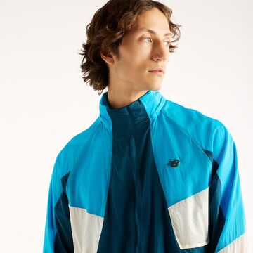 new balance - Chaqueta deportiva en azul