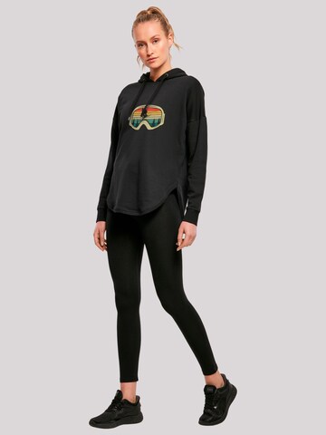 Sweat-shirt 'Retro Skibrille Wintersport' F4NT4STIC en noir
