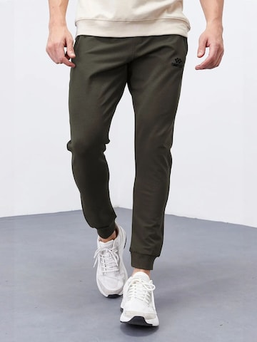 Tommy Life - Calças de desporto 'Jogginghose' em verde: frente