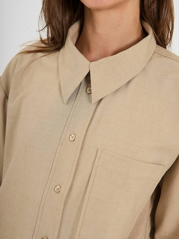 Maglietta di NORR in beige