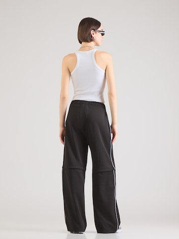 HUGO Lużny krój Spodnie 'Nateam_B' w kolorze czarny