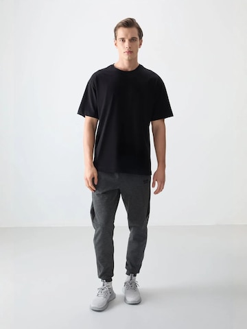 Tommy Life T-Shirts in Schwarz