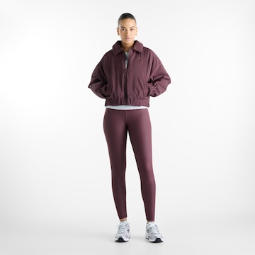 new balance - Chaqueta de entretiempo 'Woven Bomber Jacket' en marrón