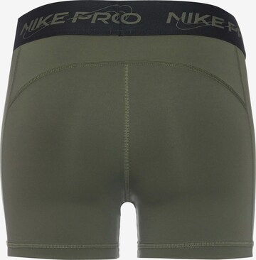 NIKE - Skinny Calças de desporto em verde