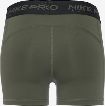 Skinny Pantaloni sport de la NIKE pe verde
