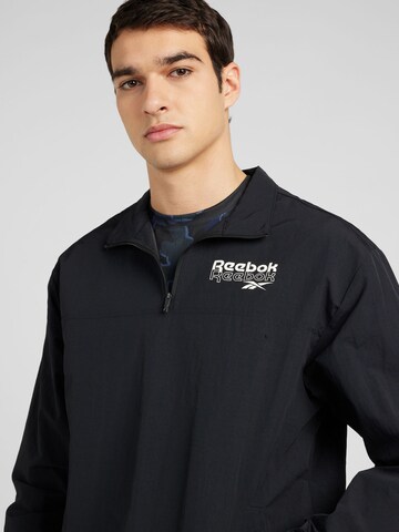 Reebok Sweatshirt 'PROUD' in Schwarz