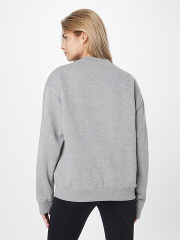 Juicy Couture Sport - Sweatshirt de desporto em cinzento
