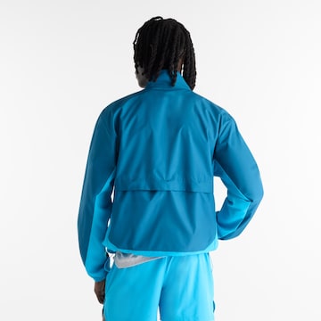 new balance - Chaqueta deportiva 'Fast Days Jacket' en azul