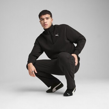 PUMA Sweatshirt 'Wardrobe Ess' in Zwart