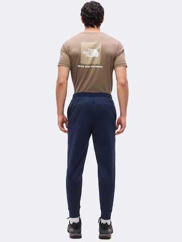 THE NORTH FACE Tapered Urheiluhousut värissä sininen