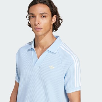ADIDAS ORIGINALS T-shirt i blå