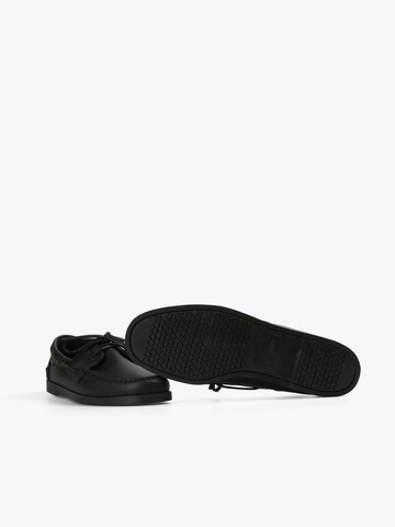 Scalpers Moccasins in Black