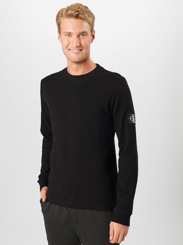 Regular T-Shirt Calvin Klein Jeans en noir : devant