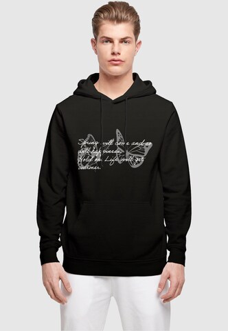 Merchcode Sweatshirt 'Spring Saying' in Zwart: voorkant