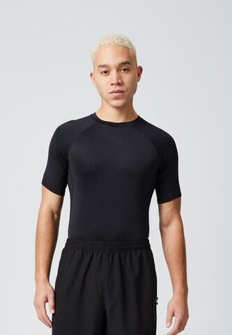 Maglia funzionale di SNOCKS in nero: frontale