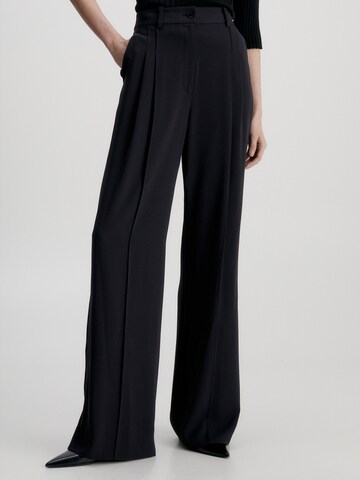 Calvin Klein Loose fit Pleat-Front Pants in Black: front