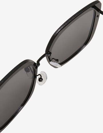 Lunettes de soleil 'December' Urban Classics en noir