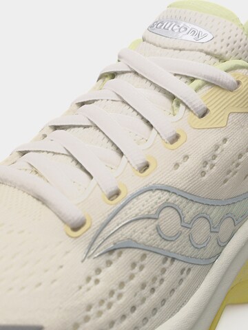 Chaussure de course saucony en beige