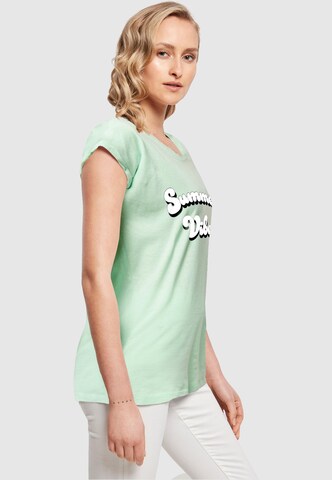 T-shirt 'Summer Vibes' Merchcode en vert
