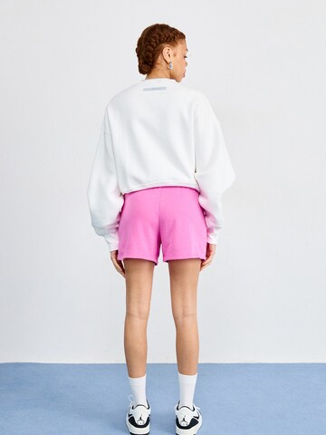 Nike Sportswear - regular Pantalón en rosa: atrás