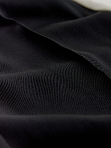 melns Next Platas staras Bikses