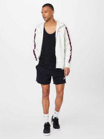 Nike Sportswear Regular Trousers 'Club' in Black