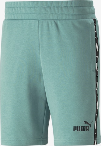 PUMA Workout Pants in Green: front