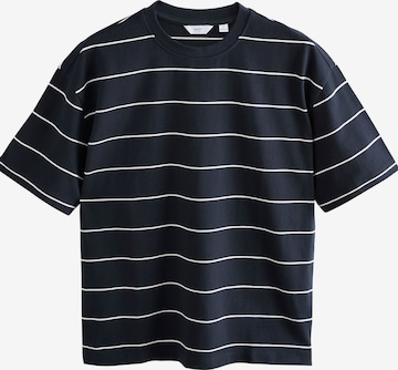 Next T-shirt i blå: framsida
