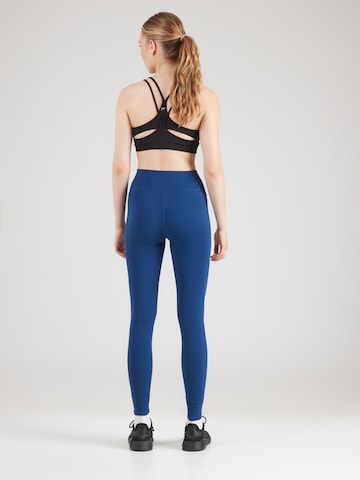 UNDER ARMOUR - Skinny Pantalón deportivo 'Motion' en azul