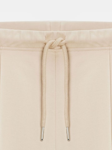 Dilvin Flared Pants in Beige