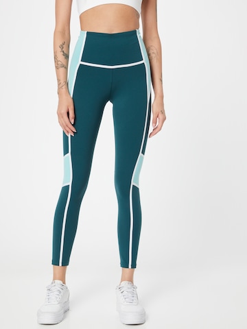 Reebok Skinny Workout Pants in Green: front