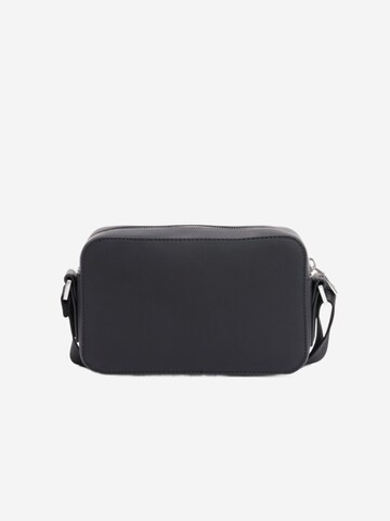 LACOSTE Crossbody bag 'Lacoste Petit sac messenger Homme Langon Petit Piqué Noir' in Black