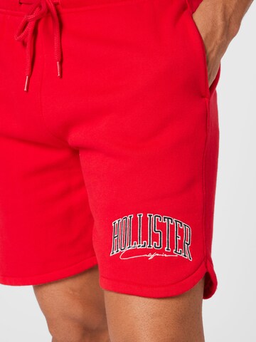 HOLLISTER Regular Trousers in Red
