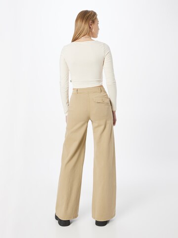 Wide leg Pantaloni di Urban Classics in beige