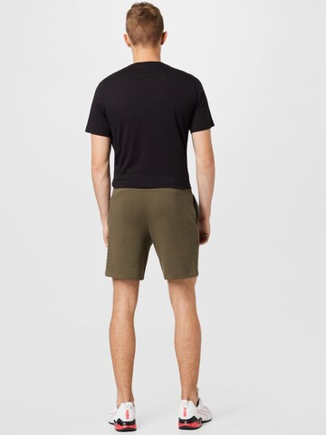 PUMA Regular Shorts in Grün